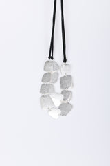 Collana con pendenti geometrici