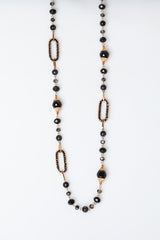 Collana lunga con decorazioni ovali