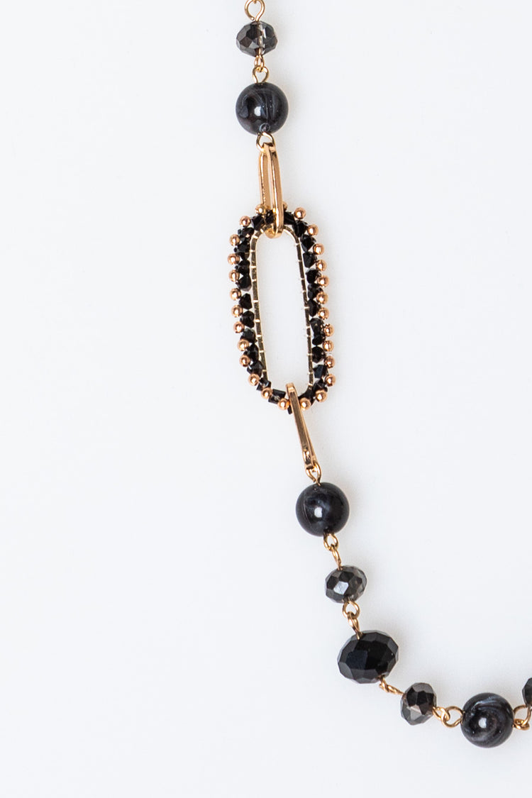 Collana lunga con decorazioni ovali