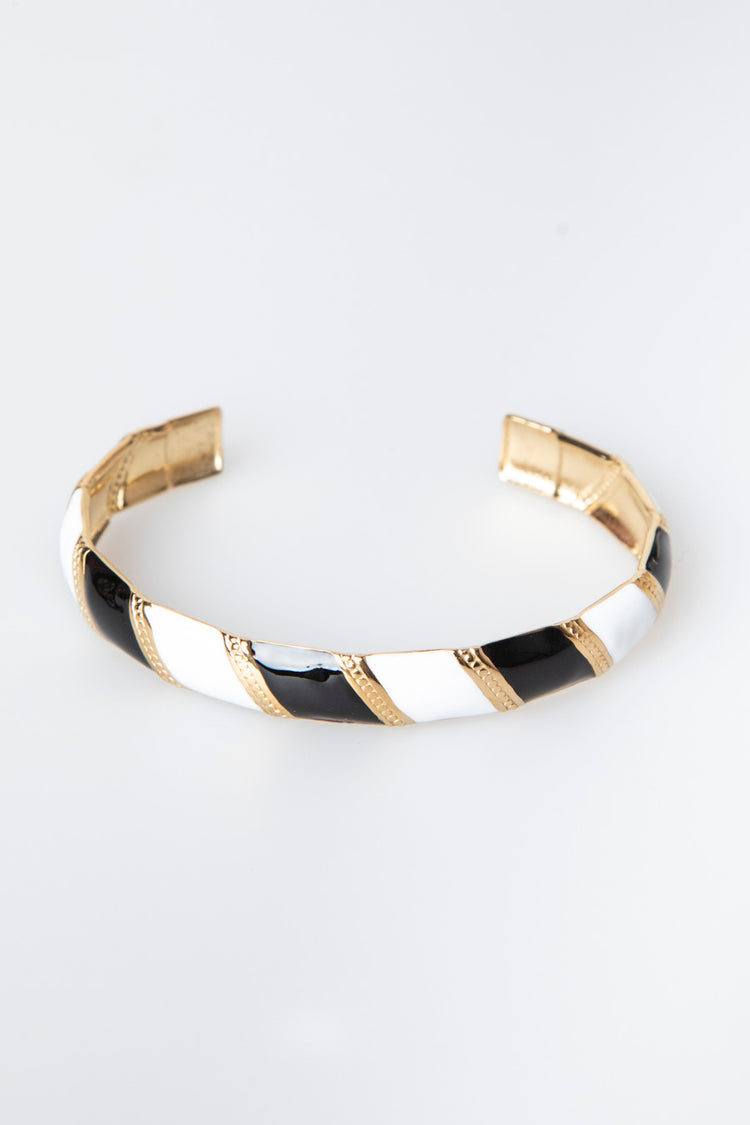 Bracciale rigido a bande diagonali