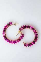 Orecchini a semicerchio con perline