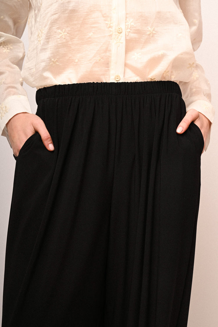 Pantaloni alla turca con tasche laterali