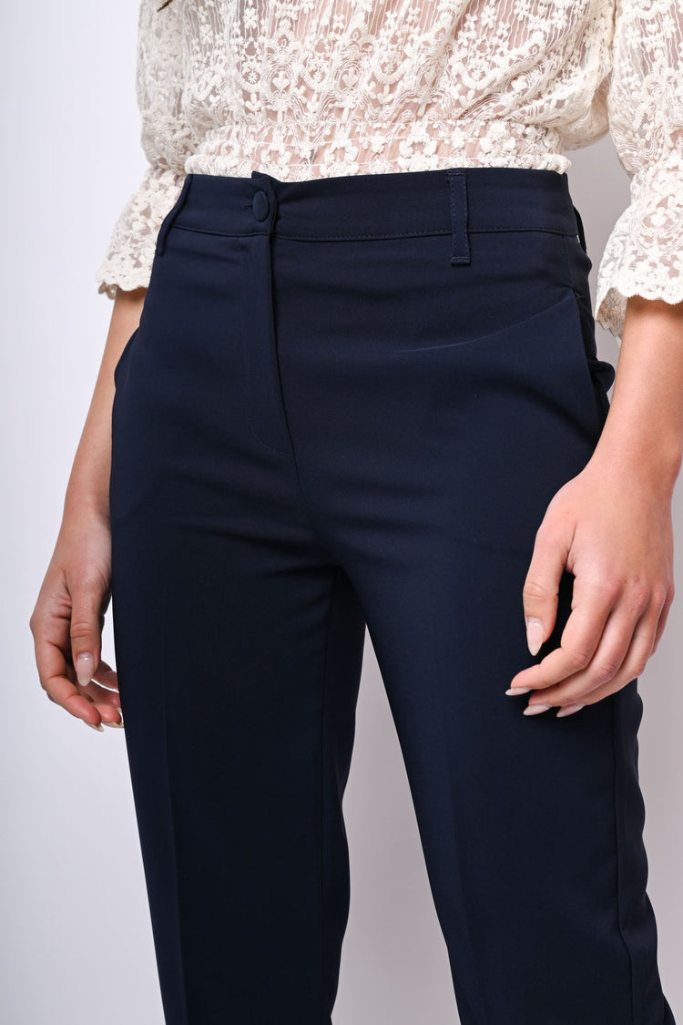 Pantaloni a sigaretta con piega stirata