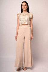 Pantaloni palazzo con bottone gioiello