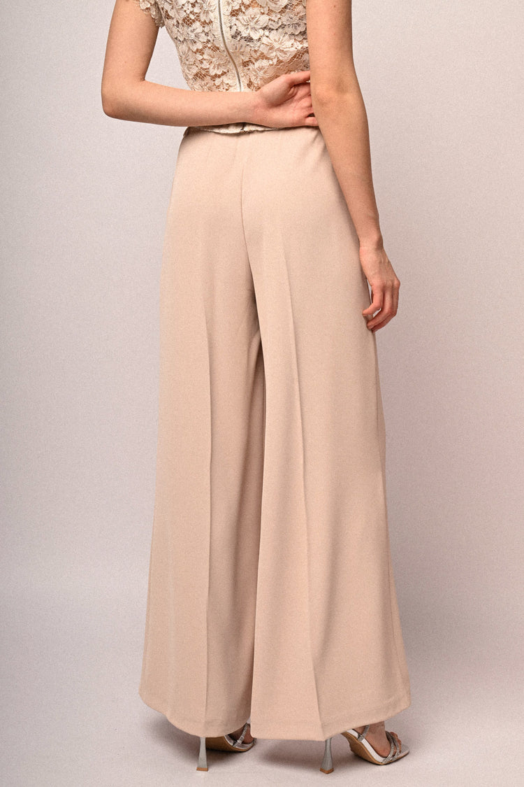 Pantaloni palazzo con bottone gioiello