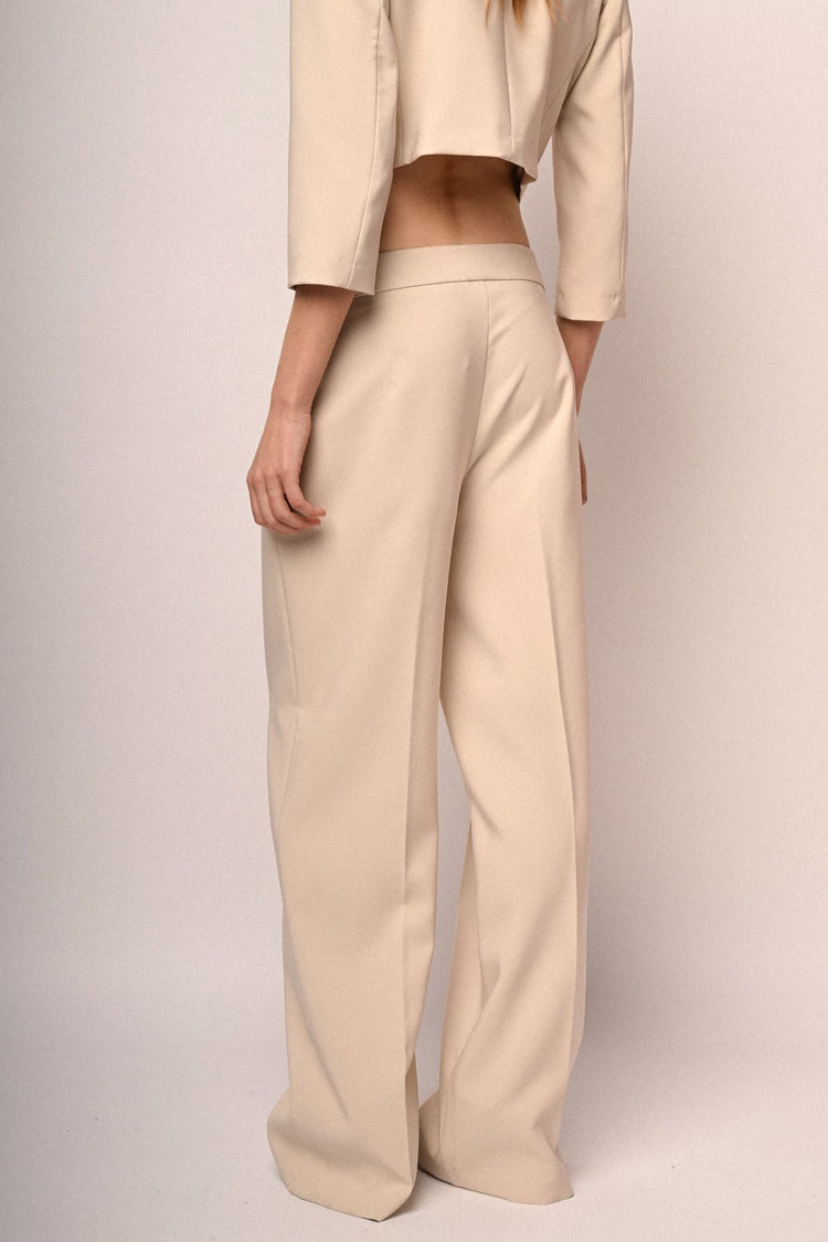Pantaloni palazzo con bottone gioiello