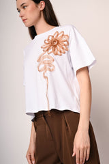 T-shirt con applicazione floreale