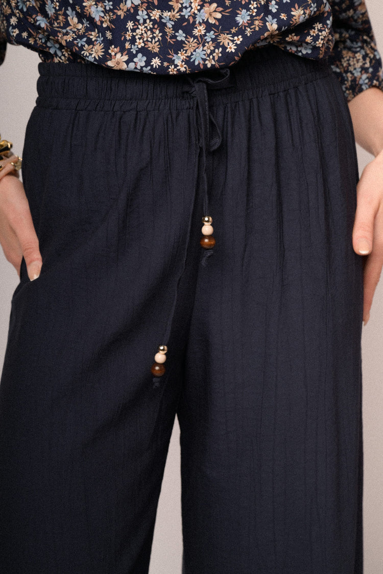 Pantaloni palazzo in viscosa blu con vita elasticizzata