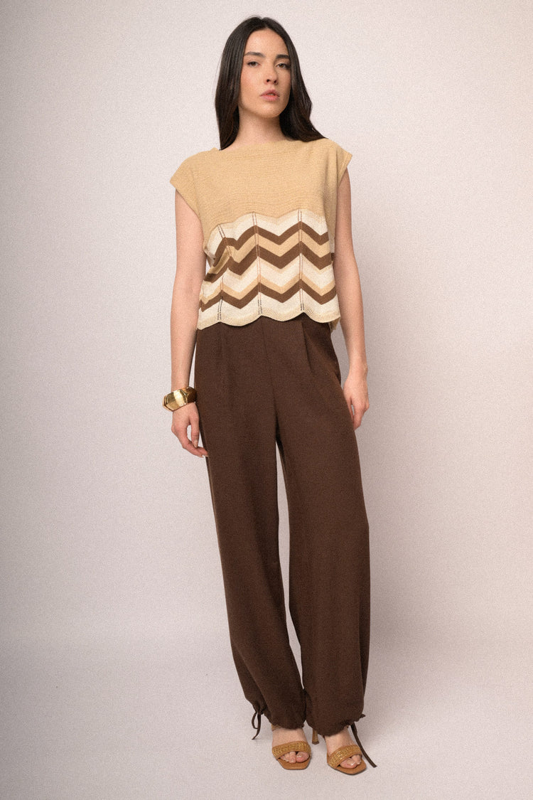 Top in maglia beige con righe zig-zag multicolor
