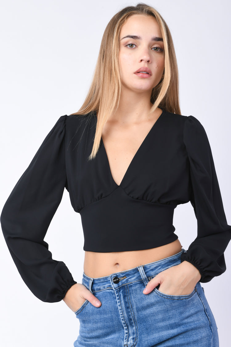 Top crop con maniche a sbuffo