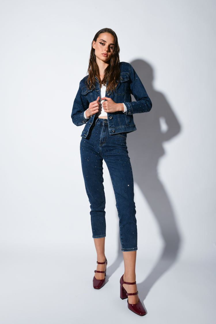 Jeans con mini borchie