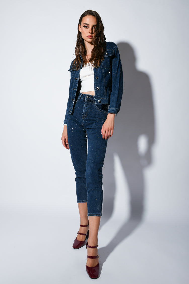 Jeans con mini borchie