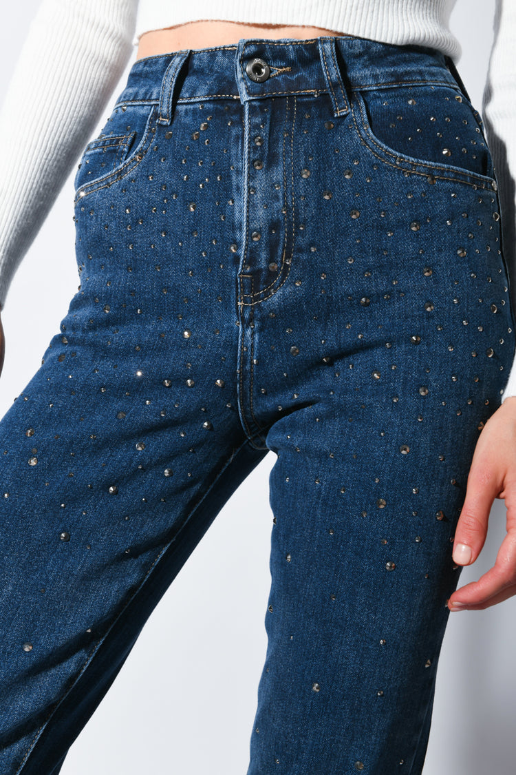 Jeans con mini borchie
