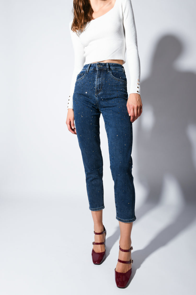 Jeans con mini borchie