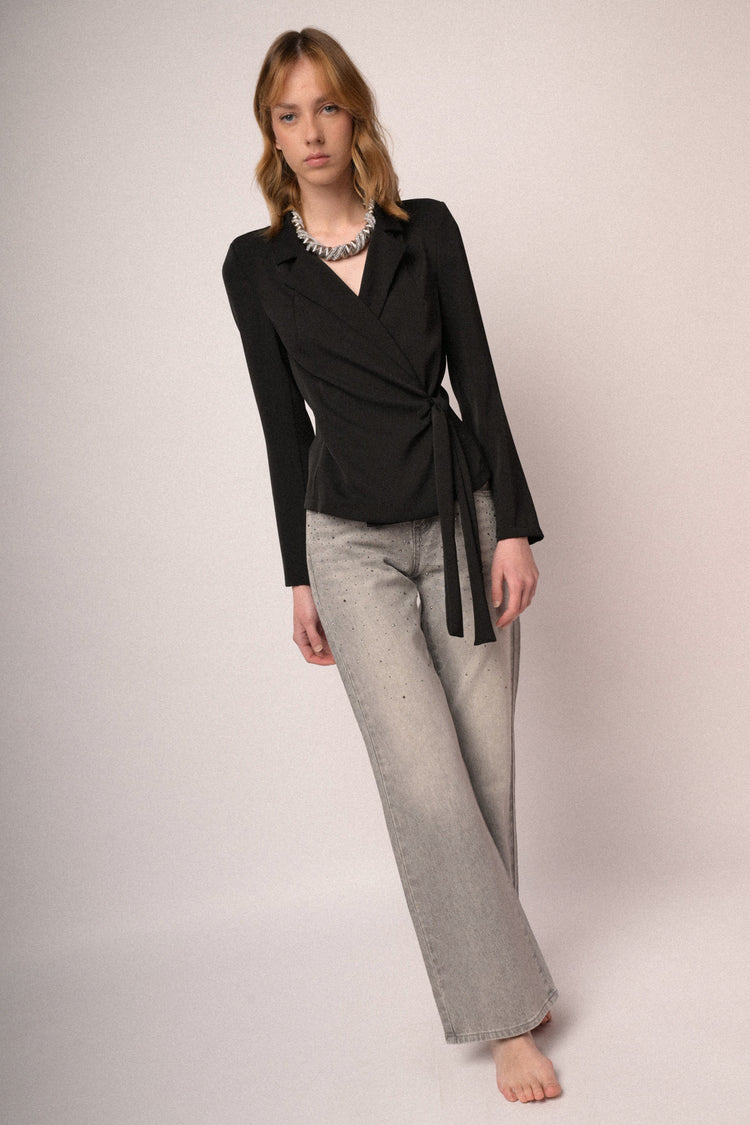 Jeans a a gamba ampia in denim grigio con decorazione strass