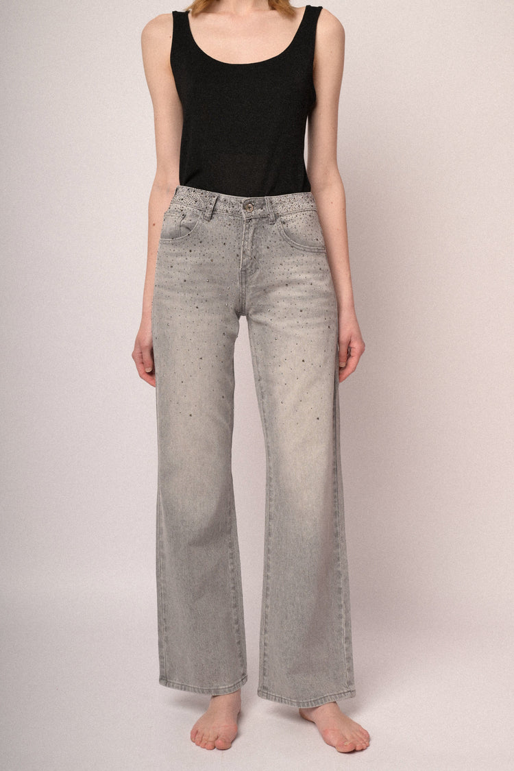 Jeans a a gamba ampia in denim grigio con decorazione strass