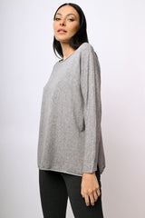 Pull oversize con spacchetti