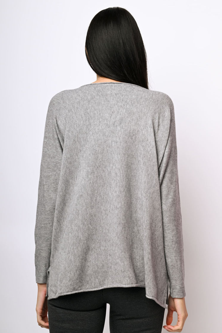 Pull oversize con spacchetti