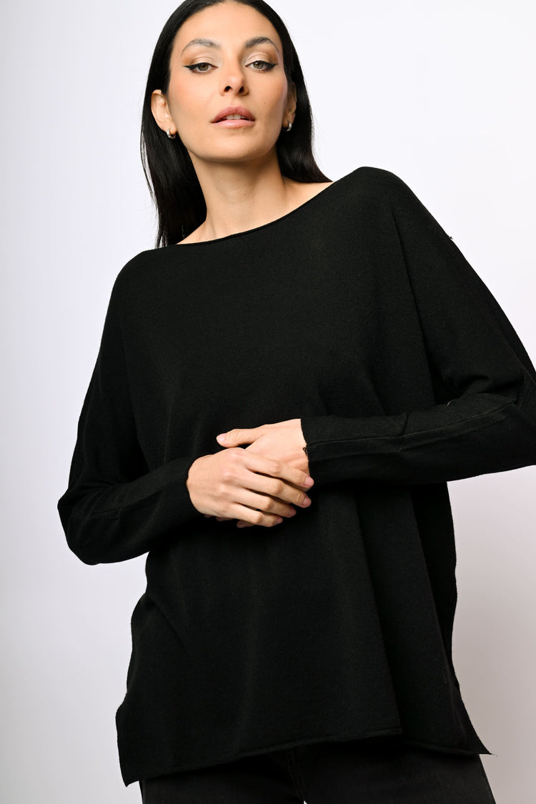 Pull oversize con spacchetti