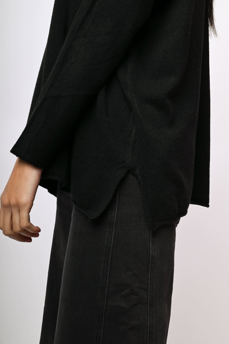 Pull oversize con spacchetti