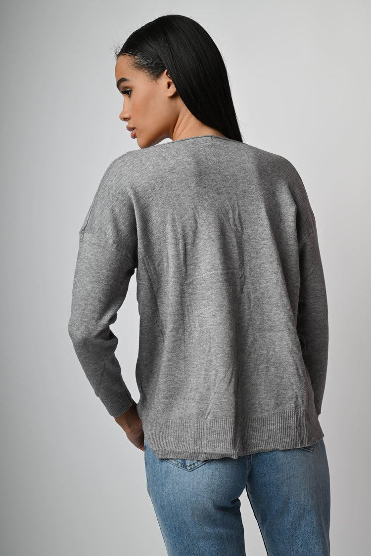 Pull con ampio scollo a V