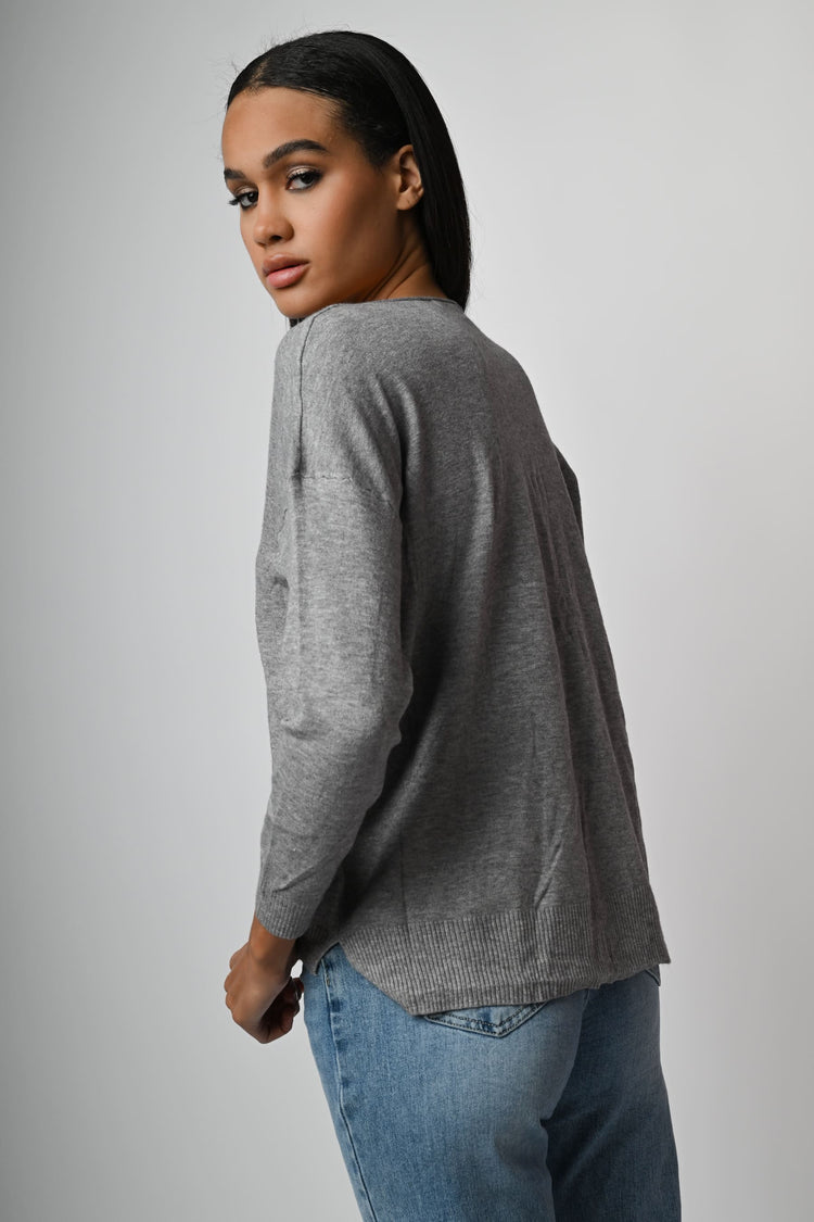 Pull con ampio scollo a V