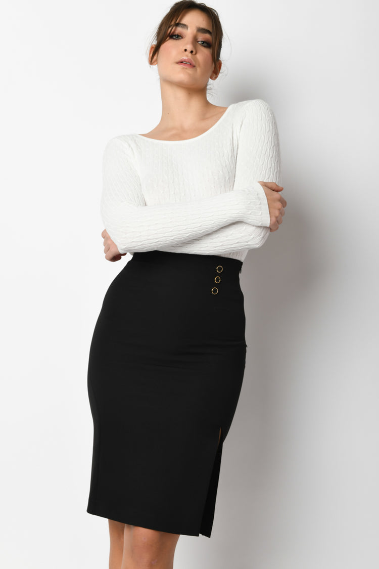Pull a trecce con scollo tondo