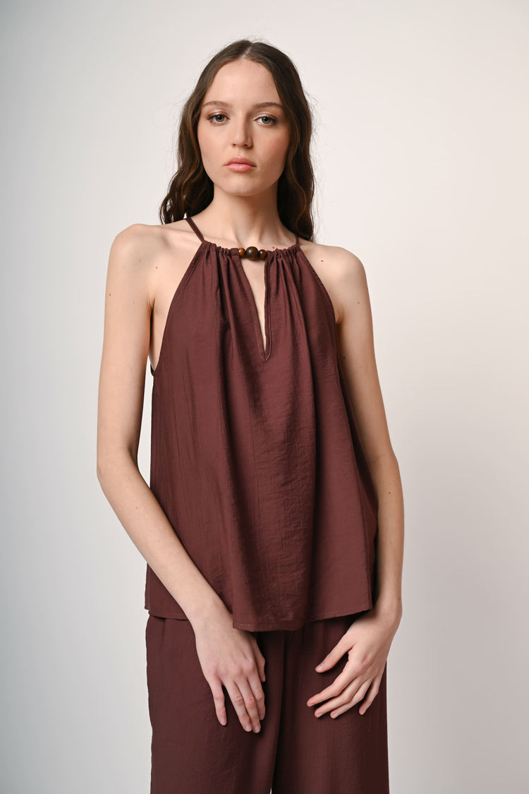 Top con perline in legno