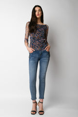 Jeans skinny con bottoni sulle tasche