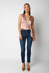 Jeans skinny con bottoni gioiello