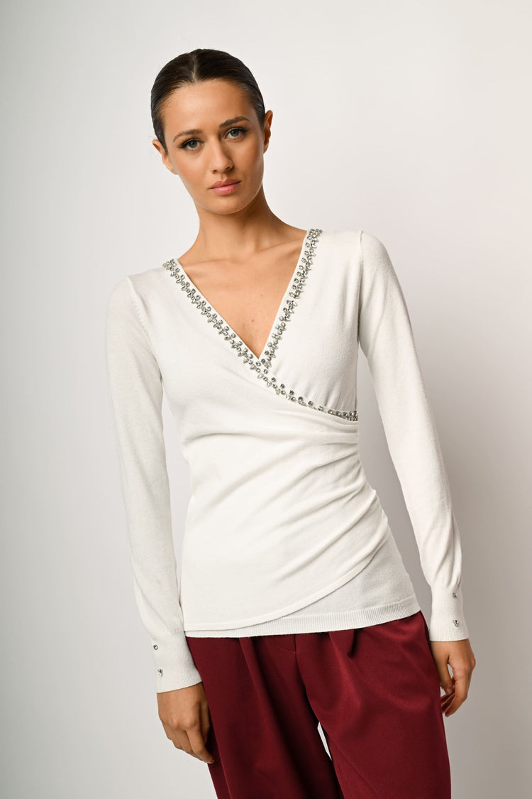 Pull a incrocio con decorazione gioiello