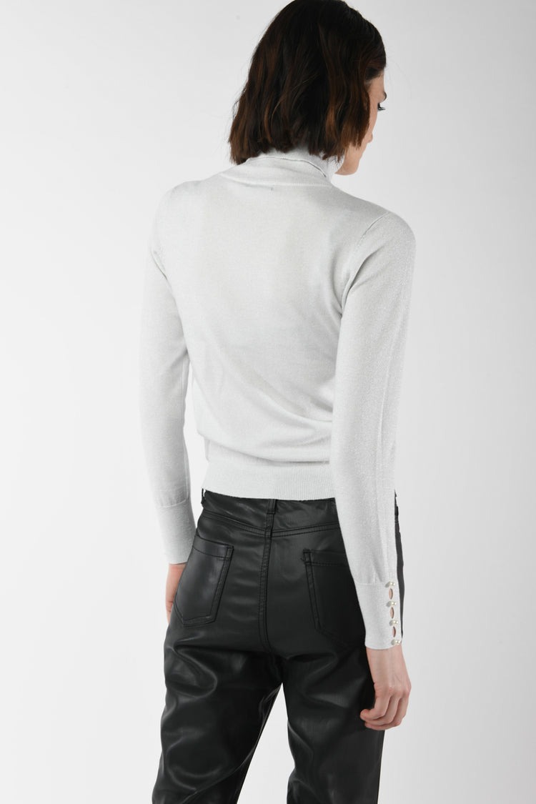 Dolcevita in maglia lurex con perle