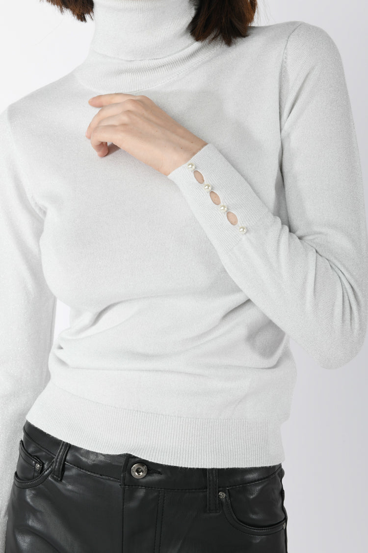 Dolcevita in maglia lurex con perle