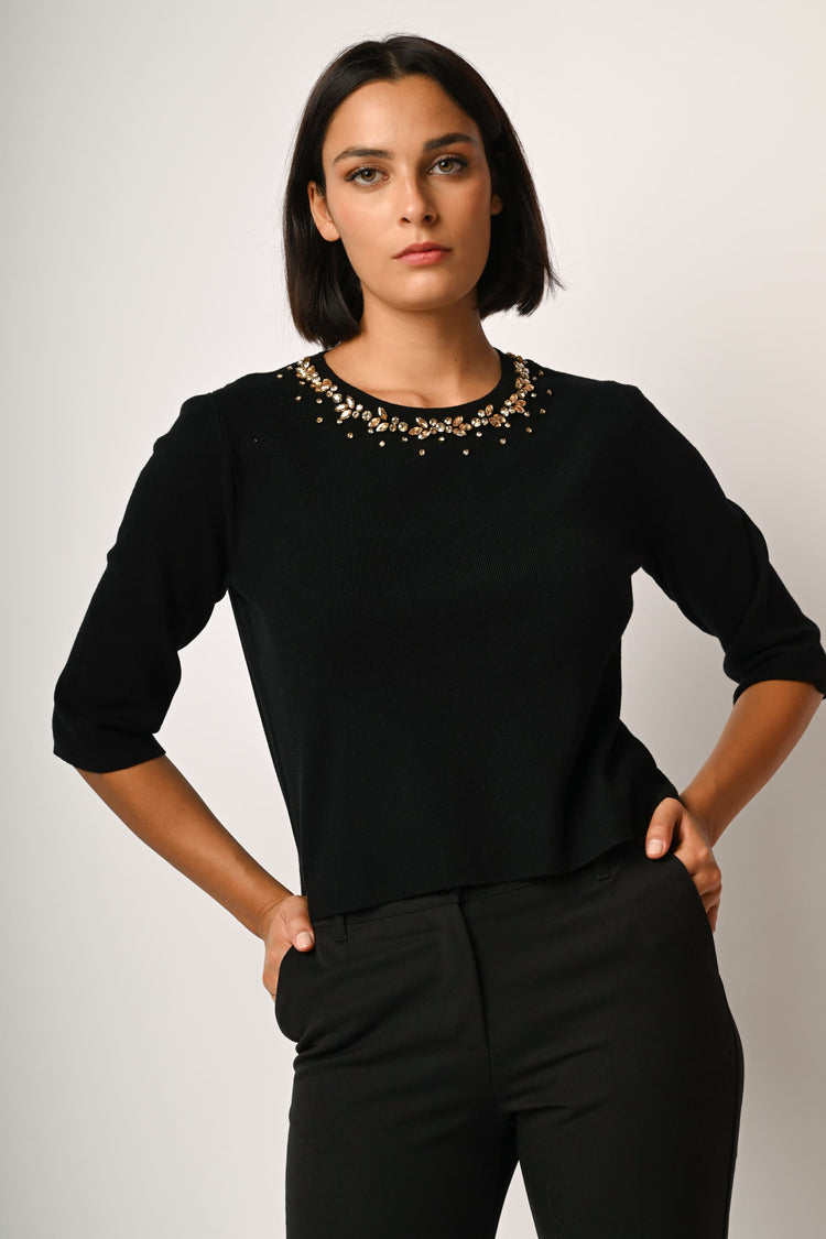 Pull con strass decorativi