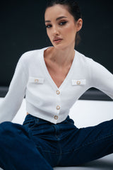 Cardigan crop con bottoni gioiello