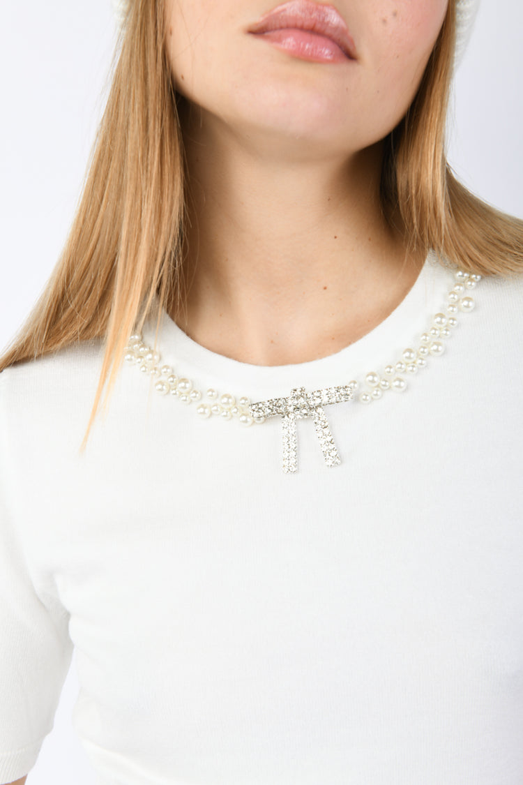 Pull con decorazione gioiello