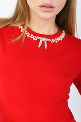 Pull con decorazione gioiello