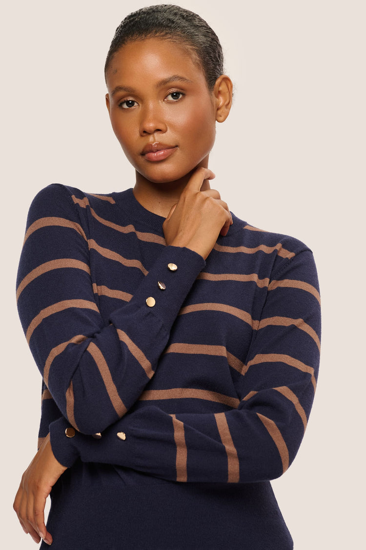 Pull a righe con bottoni ai polsini