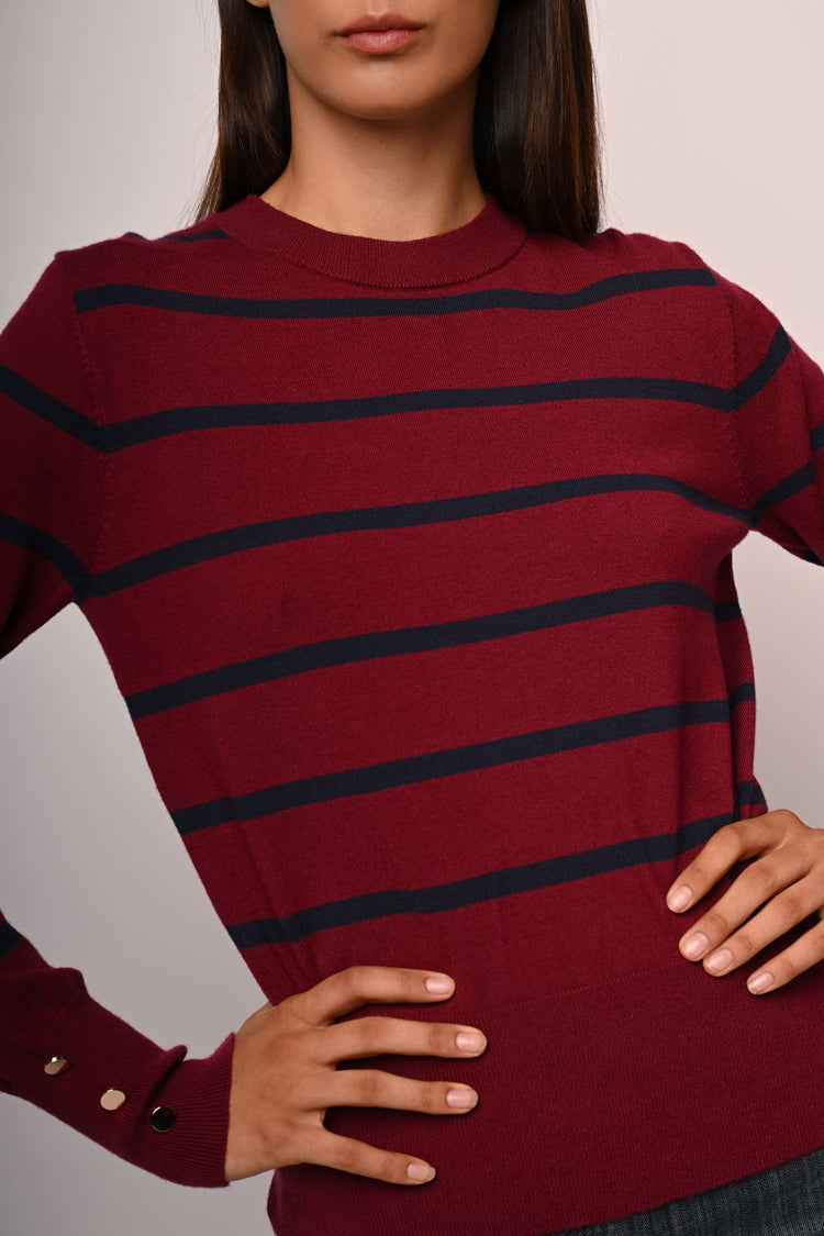 Pull a righe con bottoni ai polsini