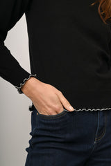 Lupetto con profili lurex ondulati