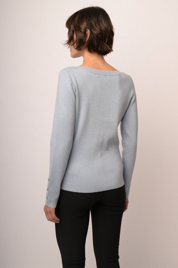 Pull in maglia lurex celeste con bottoni ai polsini