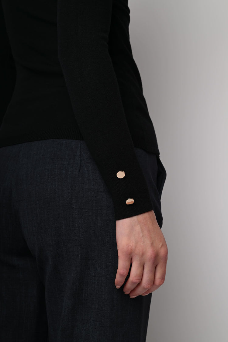 Pull con design incrociato