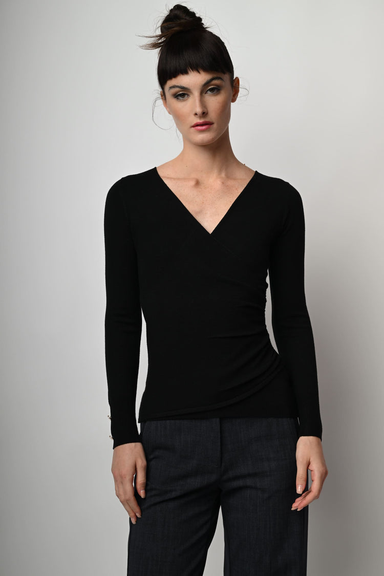 Pull con design incrociato