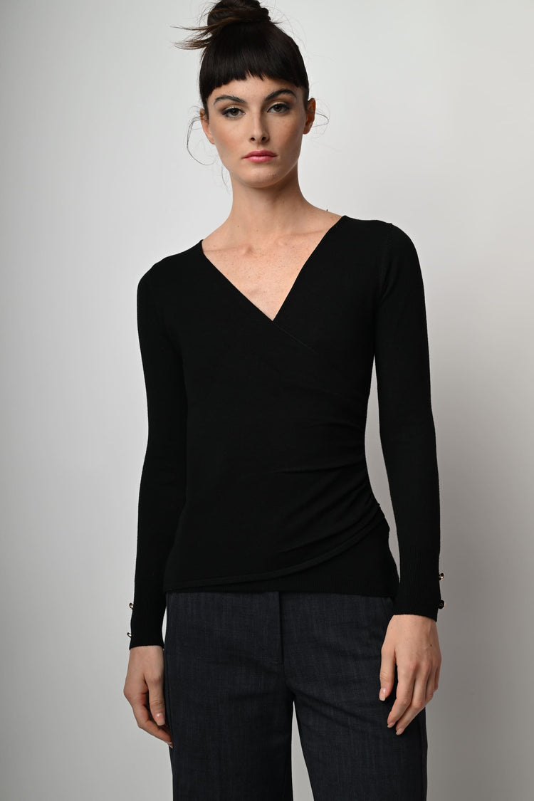 Pull con design incrociato