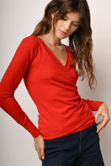 Pull incrociato con decorazione strass