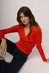 Pull incrociato con mini strass