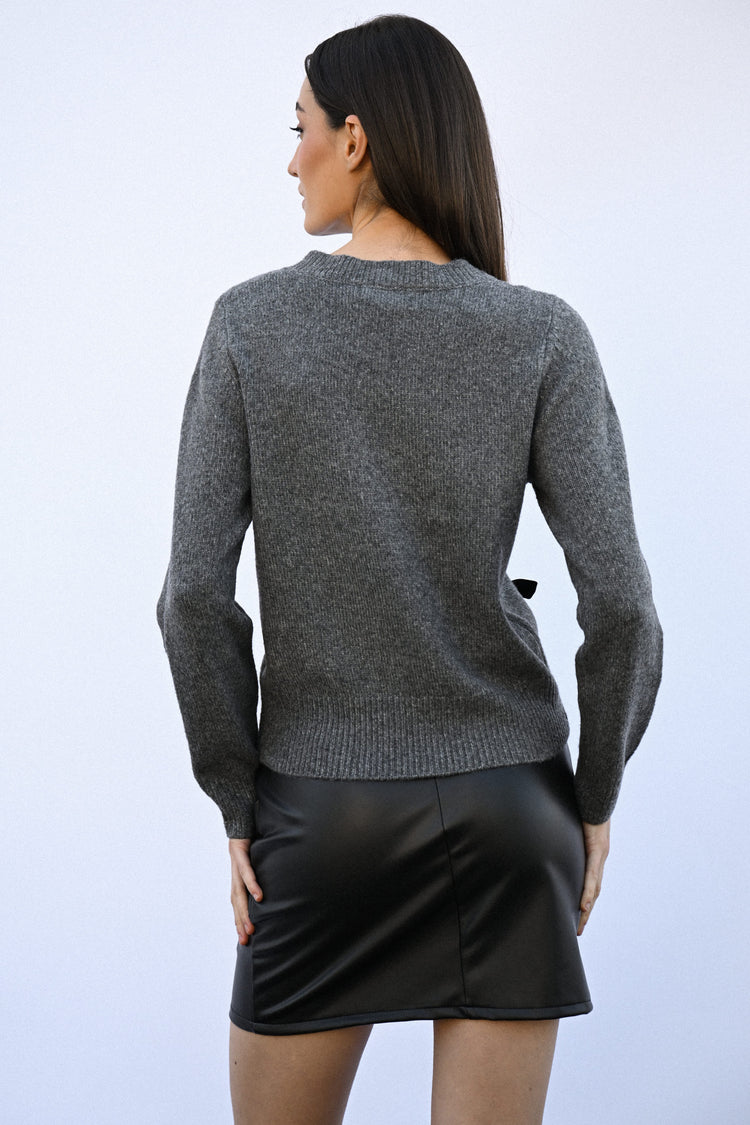 Pull con decorazione fiocchi