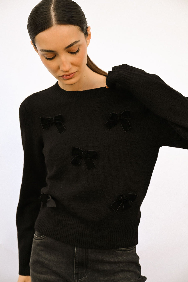 Pull con decorazione fiocchi