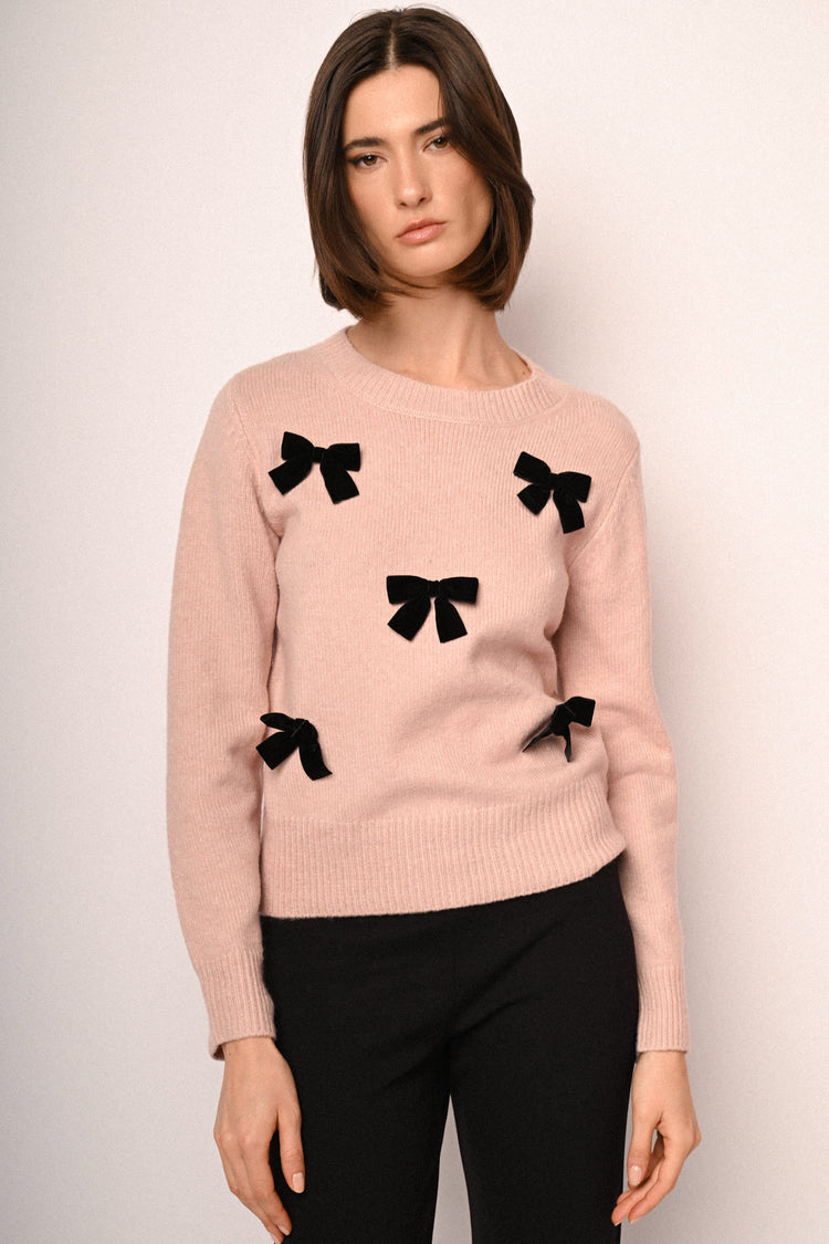 Pull con decorazione fiocchi