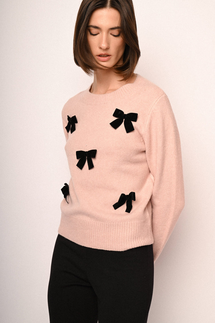 Pull con decorazione fiocchi